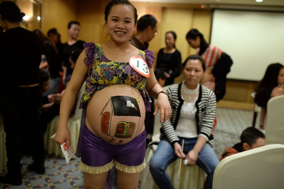 中国妈妈怀孕趣图之肚皮画七